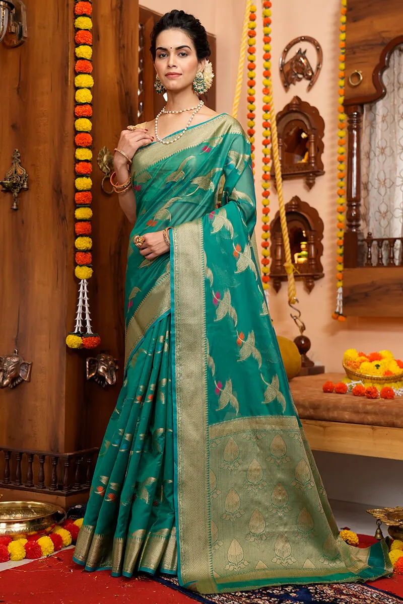 Appealing Rama Organza Silk Saree With Evanescent Blouse Piece