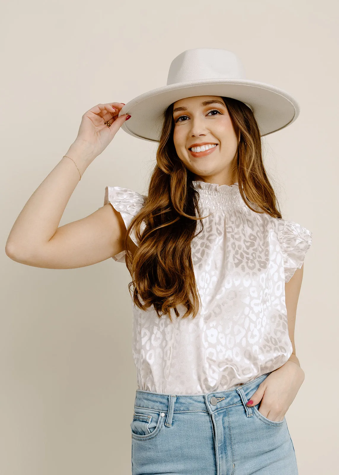 Cream Animal Print Ruffle Top