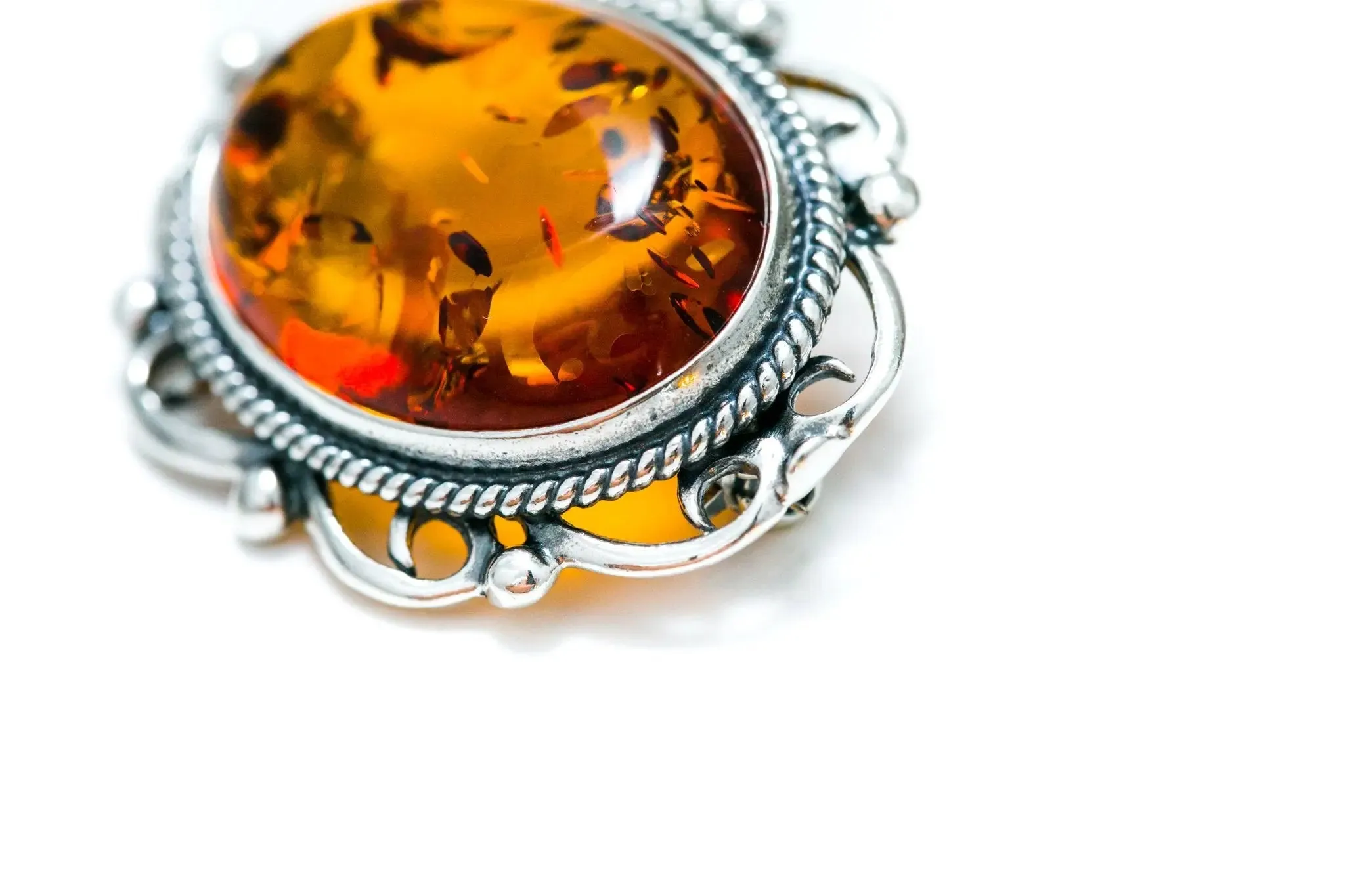 Oval Classic Framed Amber Brooch